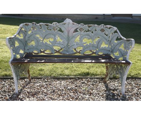 A Victorian iron garden bench, of decorative form
