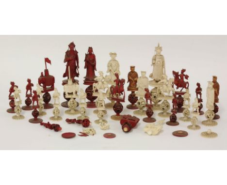 A 19th century carved Canton ivory chess set, with natural and stained red pieces, a/f (qty)