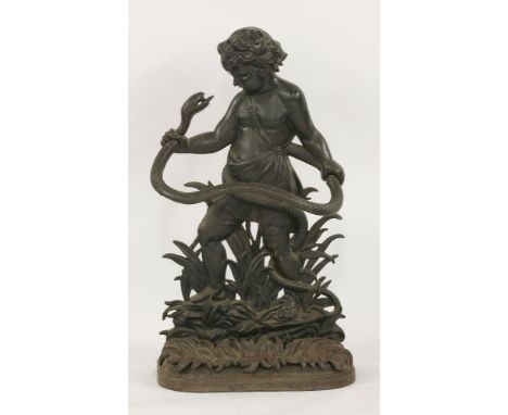 A cast iron stick stand, depicting a boy and serpent, by William Miller, ..., Wolverhampton, 48cm wide