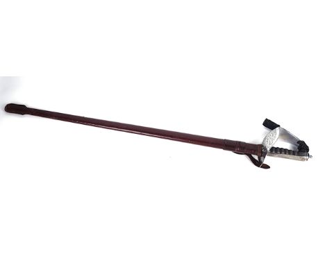 A GEORGE VI 1897 PATTERN INFANTRY OFFICER'S SWORDWith the original leather scabbard and outer leather case, overall length of