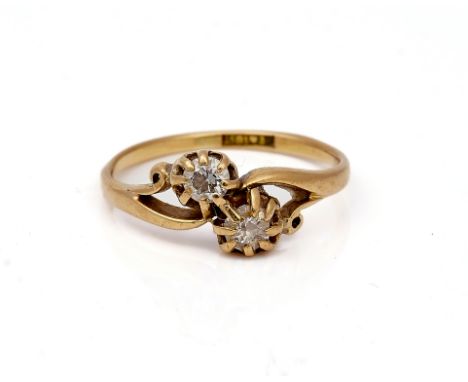 A GOLD AND PLATINUM DIAMOND TWO STONE RINGClaw set with two variously cut diamonds, in a twistover design, detailed PT &amp; 