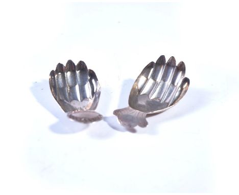TWO SILVER CADDY SPOONS FORMED AS HANDS (2)Each handle of differing design, with engraved decoration, both possibly by Joseph