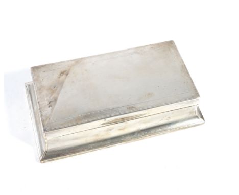 A SILVER TABLE CIGARETTE BOXOf waisted rectangular form, wooden lined within, the exterior engine turned, size 20cm x 11cm, L