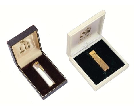TWO GAS LIGHTERS (2)Comprising; a gilt metal mounted Dunhill curved rectangular lighter, with the original guarantee booklet,
