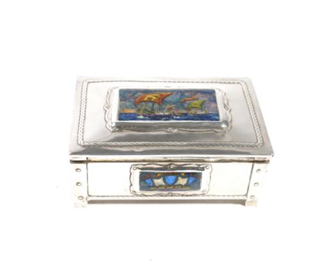 AN ARTS &amp; CRAFTS SILVER AND ENAMEL MOUNTED TABLE CIGARETTE BOX OF NAVAL INTERESTThe hinged lid enamelled with a view of t