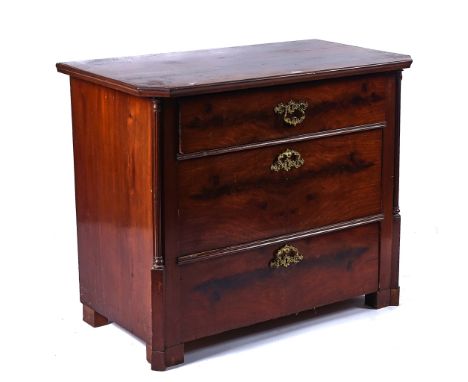 A MID-19TH CENTURY DUTCH MAHOGANY COMMODEWith canted fluted column angles flanking three drawers, 96cm wide; 78cm high