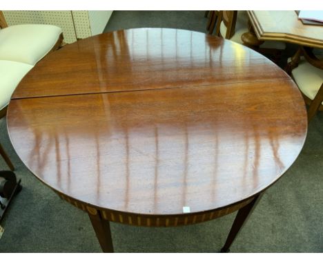 A PAIR OF GEORGE III MAHOGANY DEMI-LUNE CONSOLE TABLES (2)Each with inlaid frieze on tapering square supports, 123cm wide; 71