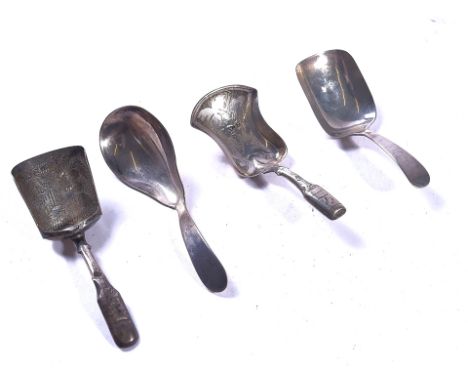 FOUR SILVER CADDY SPOONS (4)The first of shovel form, the bowl engraved with a floral spray, Birmingham 1824, the second with
