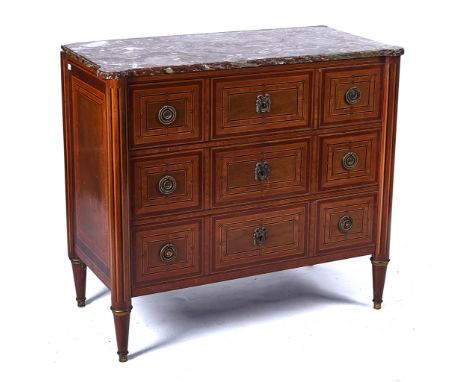 A LOUIS XVI STYLE MARBLE TOPPED COMMODEWith inlaid mahogany and kingwood three drawer base, on turned supports 95cm wide; 85c