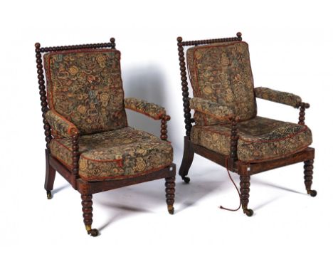 A PAIR OF EARLY 19TH CENTURY FAUX ROSEWOOD OPEN ARMCHAIRSWith bobbin turned frames, 60cm wide; 94cm high (2)Condition report: