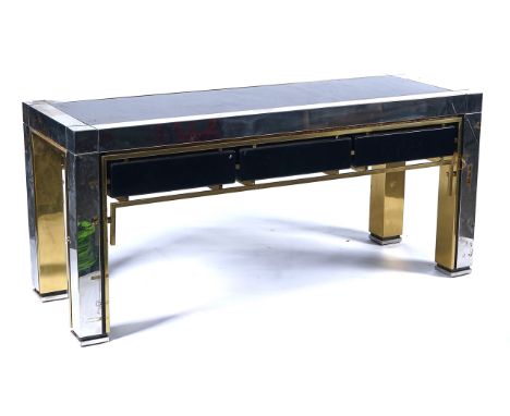 POSSIBLY WILLY RIZZO; A LACQUERED BRASS AND CHROME CONSOLE TABLEWith three ebonised frieze drawers on block supports, 170cm w