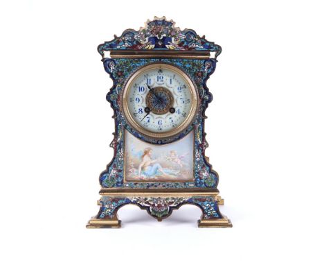 A FRENCH BRASS AND CHAMPLEVE ENAMEL MANTEL CLOCKLate 19th Centurythe front with a painted porcelain panel, signed to the lowe
