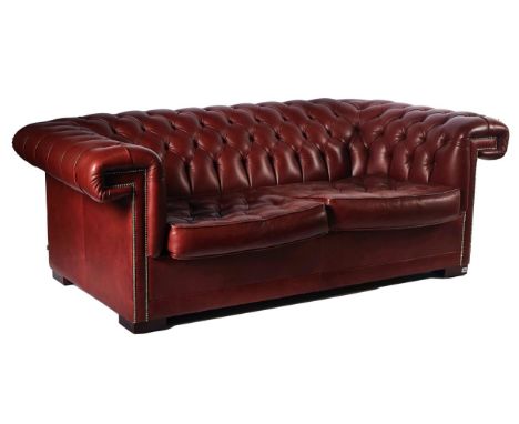 LINLEY; A CHESTERFIELD SOFAWith studded rouge leather upholstery on block supports, 223cm wide; 108cm depth; 80cm high, inter