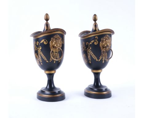A PAIR OF REGENCY STYLE PARCEL-GILT DECORATED TOLEWARE CHESTNUT URNS AND COVERSModernOf navette form with lion mask ring hand