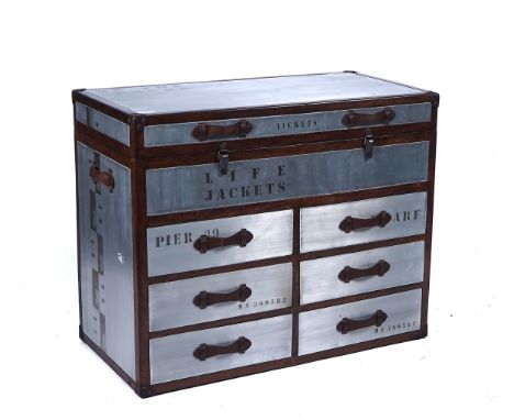 A MODERN SIDE CABINET MODELLED AS A 19TH CENTURY TRAVELLING TRUNKThe hinged top over six short drawers 100cm wide; 80cm highC