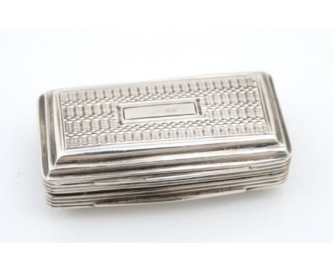 A GEORGE IV SILVER VINAIGRETTEOf rectangular form, with a floral and scroll engraved grille, the exterior engine turned and w