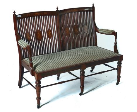 AN EDWARDIAN INLAID MAHOGANY FRAMED SOFAWith inlaid splat and turned supports, 119cm wide; 95cm high