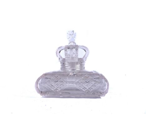 A CUT GLASS SCENT BOTTLE, STOPPER AND COVER19th centuryOf square cushion form, the sides cut with panels of strawberry diamon