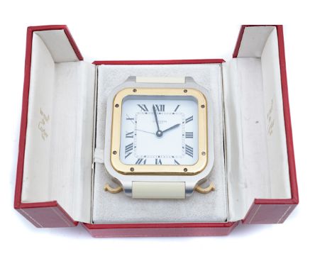 A CARTIER PARIS QUARTZ TRAVELLING ALARM CLOCKThe signed white dial with black Roman hour numerals, with a Watches of Switzerl