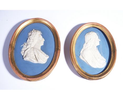 TWO WEDGWOOD BLUE JASPER-DIP PORTRAIT MEDALLIONSLate 18th centuryOne depicting a man in Roman costume, the other a man in 18t