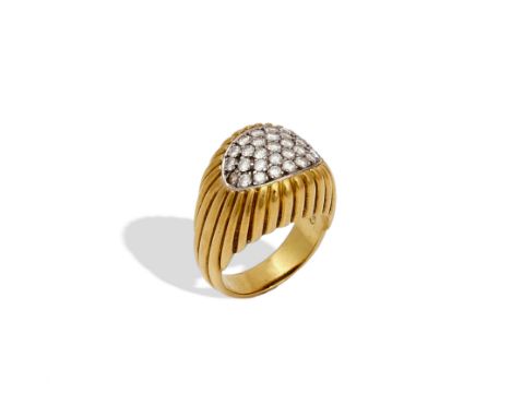 A CARTIER GOLD AND DIAMOND RINGThe curved oval front pave set with circular cut diamonds, otherwise with ridged decoration, d