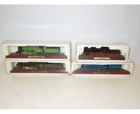 4 Cased model trains 
