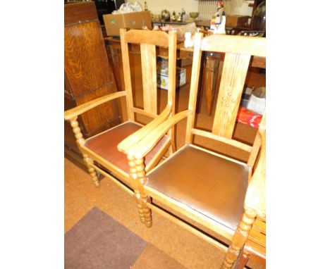 Pair of bobbin turned oak open arm chairs 