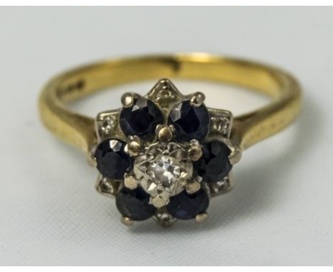 18ct Gold Dress Ring, Flowerhead Setting With 6 Sapphires And Diamond Chips, Fully Hallmarked