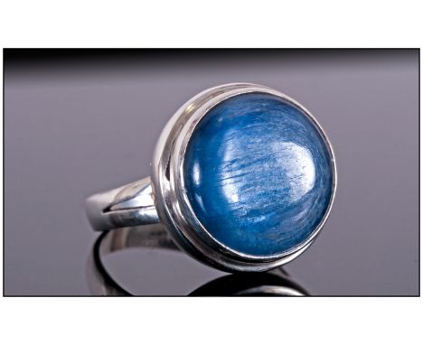 Kyanite Solitaire Hand Made Ring, a round cut, 9.3ct cabochon of the deep blue stone with the natural chatoyant effect of an 