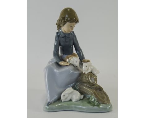 Nao By Lladro Figurine. Young Girl With Rabbits. Circa 2010. Nice Quality Figurine by Nao. Height 7 Inches. Mint Condition.