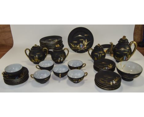 Mid 20thC Japanese Egg Shell Tea Service Black Matt Ground with Figural Landscapes And Gilt Highlights