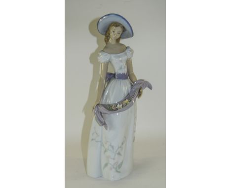 Lladro Tall Figurine "Fragrances And Colours" Model Number 6866. Sculpture Jose Luis Alvarez. Issued 2002. Stands 16.25 Inche