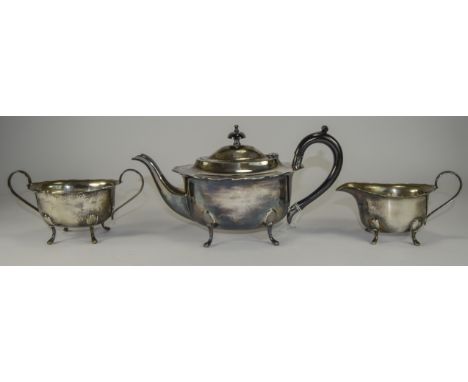 Three Piece Silver Plated Tea Service, comprising teapot with bakelite handle, two handled sugar bowl, milk jug.