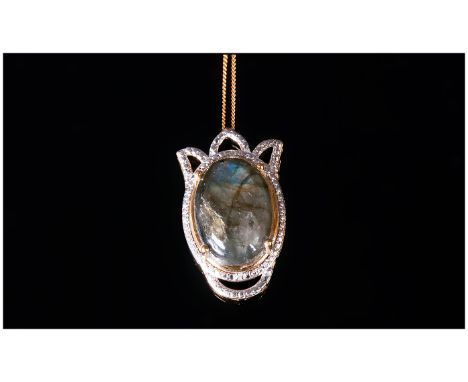 Labradorite Pendant With Chain, the labradorite cabochon, of 12.25cts, displaying a good range of inner shiller in blues, gre