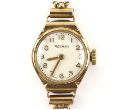 Rotary, A ladies gold oval cased wristwatch, the signed white dial with gold Arabic numeral hour markers, fitted with a  cali