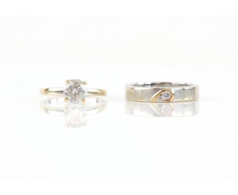 Two diamond rings, diamond single stone ring with a round brilliant cut diamond, estimated weight 1.03 carats, set in yellow 