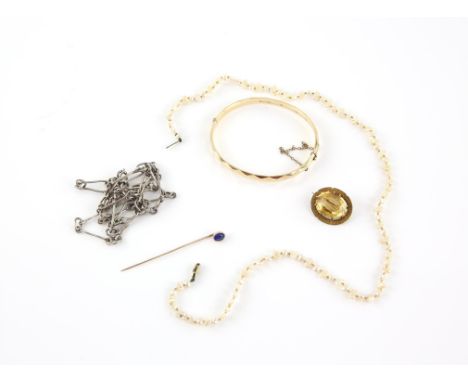 Selection of jewellery including a Victorian citrine brooch with engrave frame, with a pin and catch fitting, with a stick pi