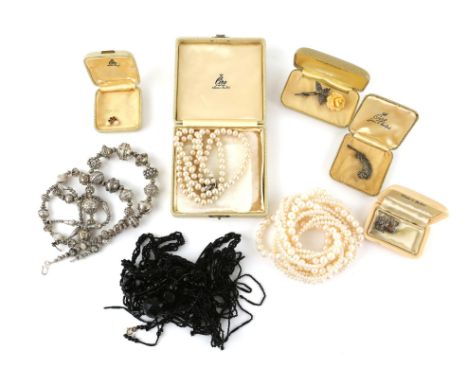 A collection of costume jewellery, including silver graduated  beaded necklaces from Bali, Steiff bear brooch in original box