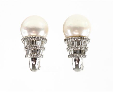 Pearl and diamond earrings, set with round brilliant cut and baguette cut diamonds, estimated total diamond weight 0.55 carat