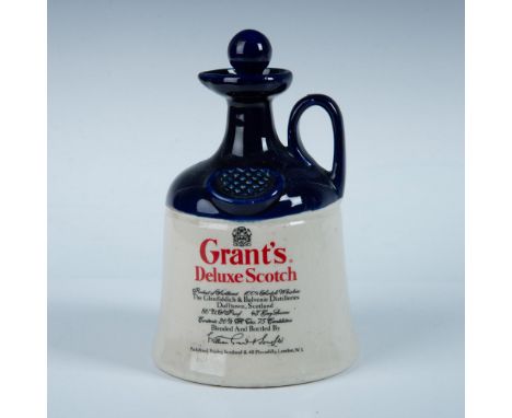 Empty stoneware whisky jug bottle, collectible with stopper, featuring cobalt blue and bare ceramic coloration. Dimensions: 8