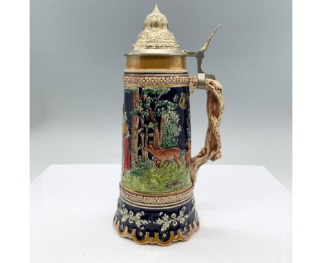 Hand painted stoneware covered tankard depicting a forest landscape with a group of people hunting deer. The melody The Third