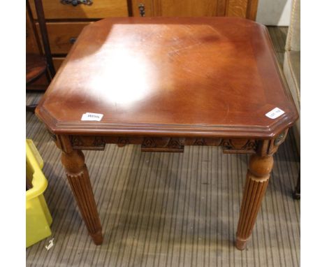 A reproduction square topped lamp type table on four reeded legs 