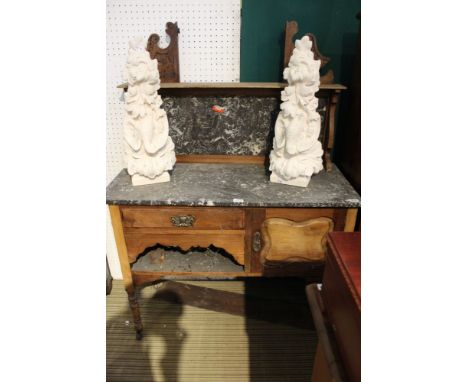 AN EARLY 20TH CENTURY MARBLE WASHSTAND with splashback and top, the wooden base unit having single drawer and cupboard door, 