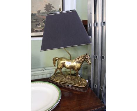 A TABLE LAMP IN THE FORM OF A GILDED MODEL HORSE 