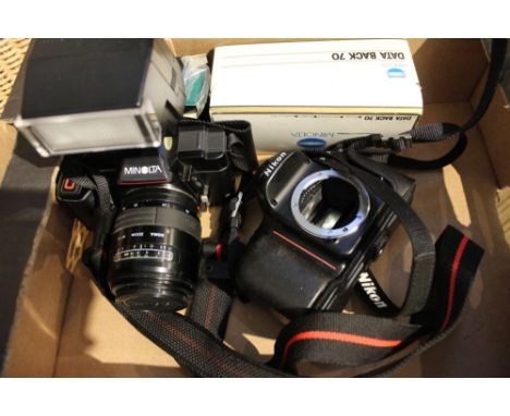 A box containing a Minolta camera, plus accessories, together with a Nikon F 50 camera body, no lens. 