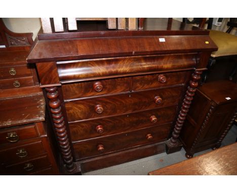 A 19th century mahogany "Scotch" chest, fitted frieze drawer over two short and three long drawers with mother-of-pearl inlai