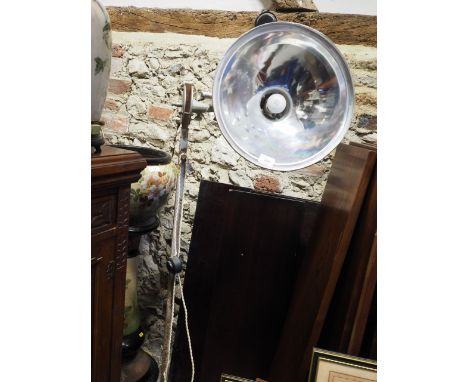 An "Industrial" standard lamp with polished reflector, on tripod base, 51" high 