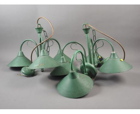 A pair of industrial style green painted metal three-light ceiling light, and a matching single wall light 