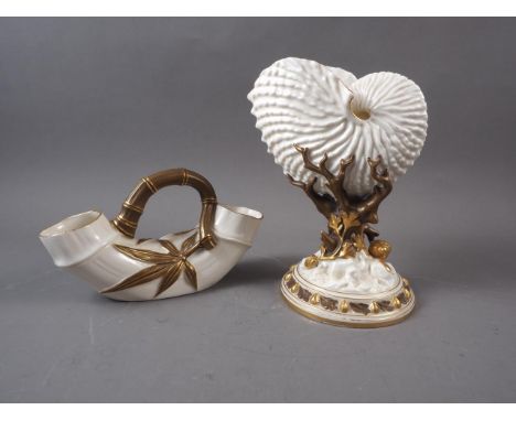 A late 19th century Royal Worcester nautilus shell vase, 8 1/2" high, and a similar bamboo style vase, 4 1/2" high Condition: