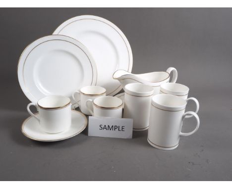 A Royal Worcester "Contessa" pattern part dinner service, six Royal Doulton "Gold Concord" pattern coffee cups and six Dunoon